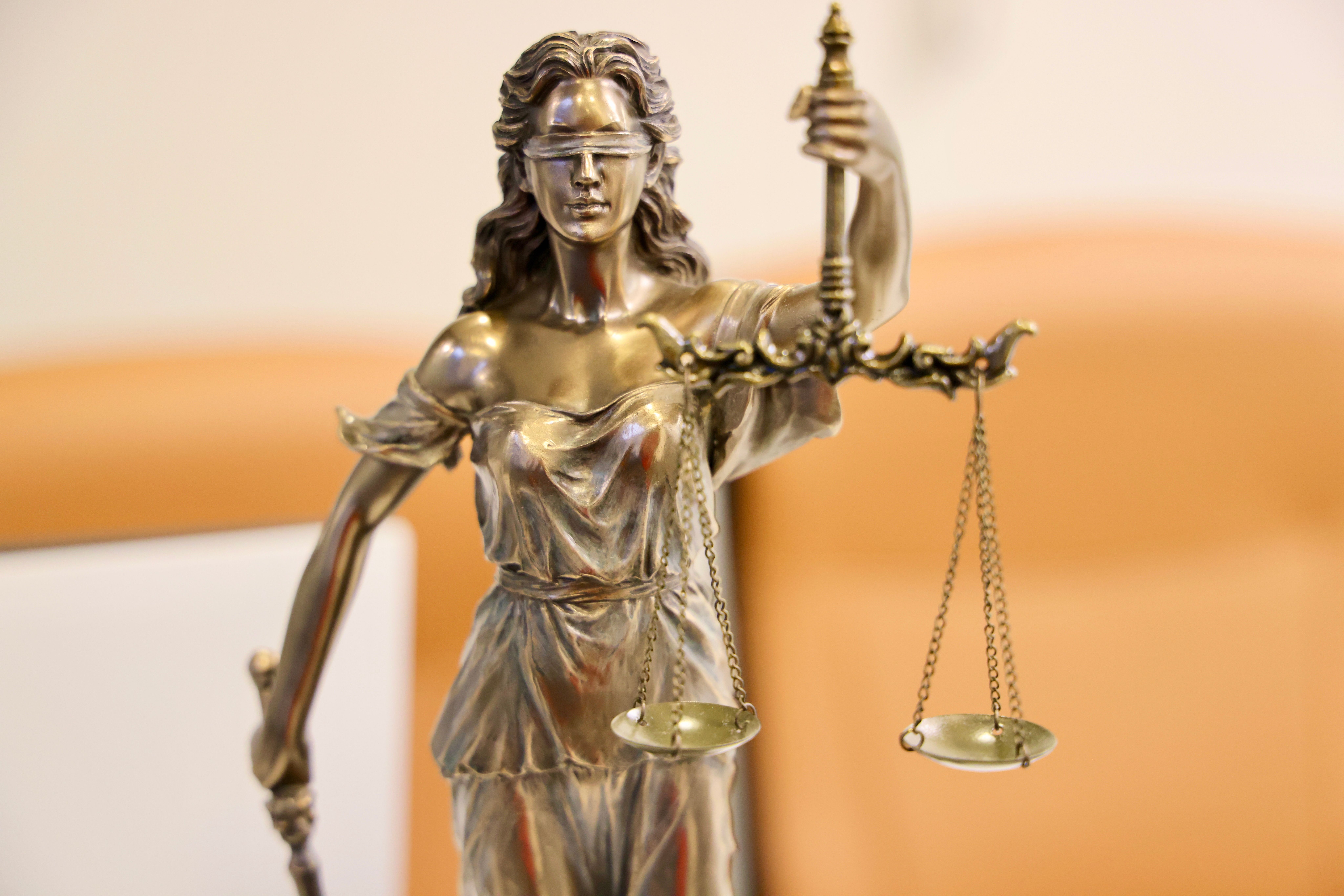 Lady Justice statue symbolizing fairness and impartiality in law